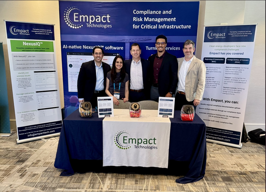 Empact Technologies team at conference booth